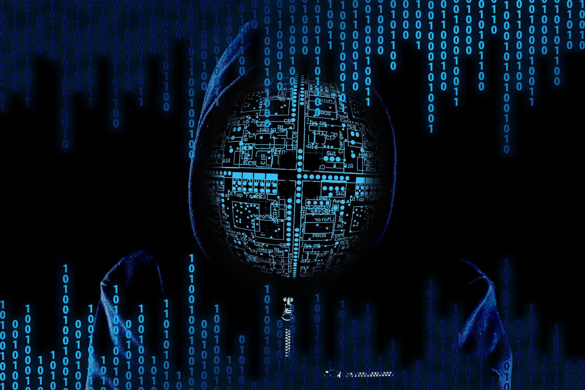 Un visage de hacker avec des 0 et des 1