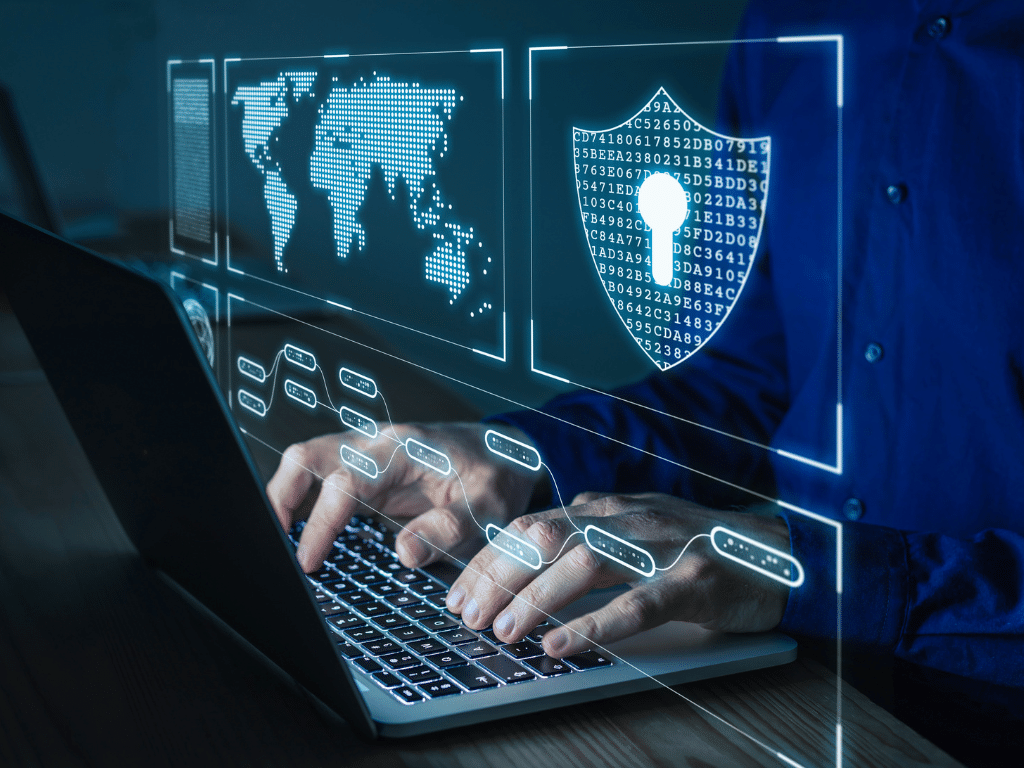 Une ordinateur portable ouvert avec des incrustations graphiques pour la cybersécurité, le cybercrime et les cyberattaques