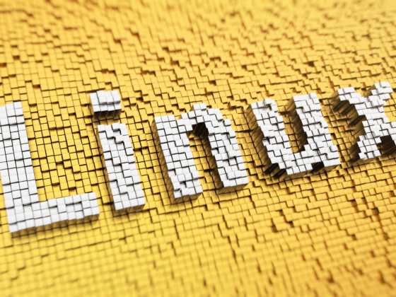 Un texte Linux en 3D sur un fond jaune