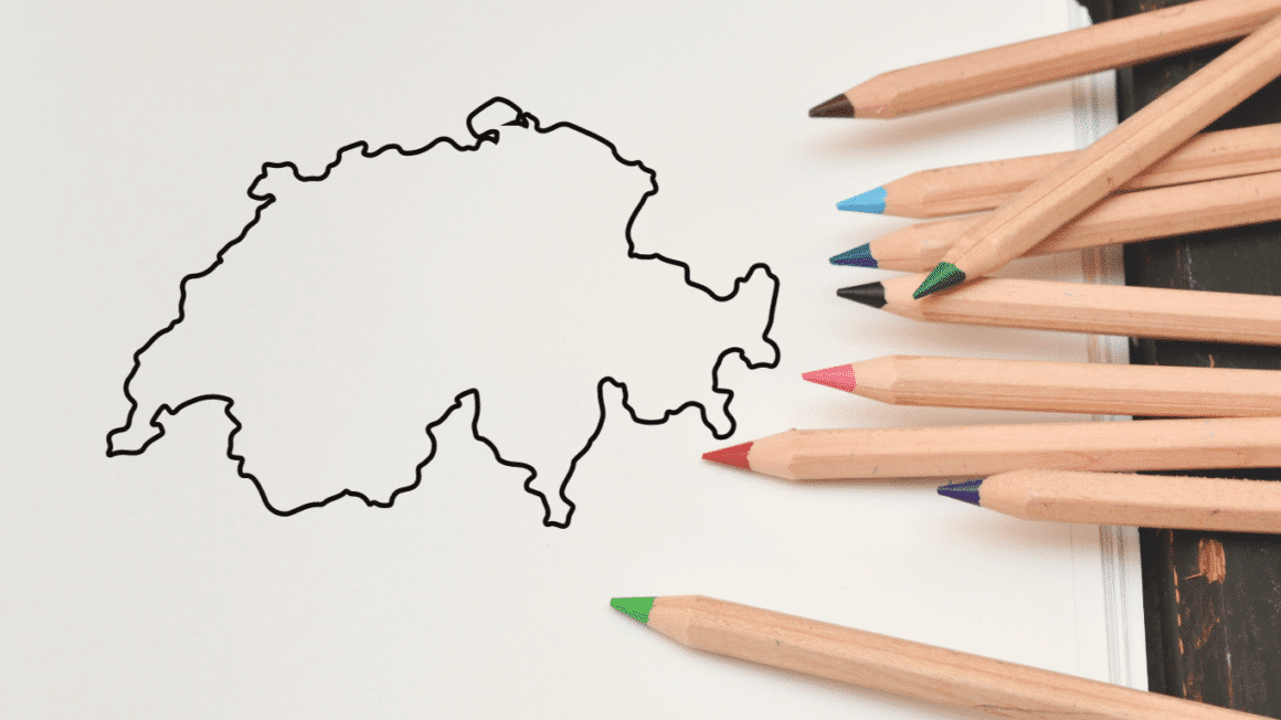 Le contour de la Suisse avec des crayons de couleurs