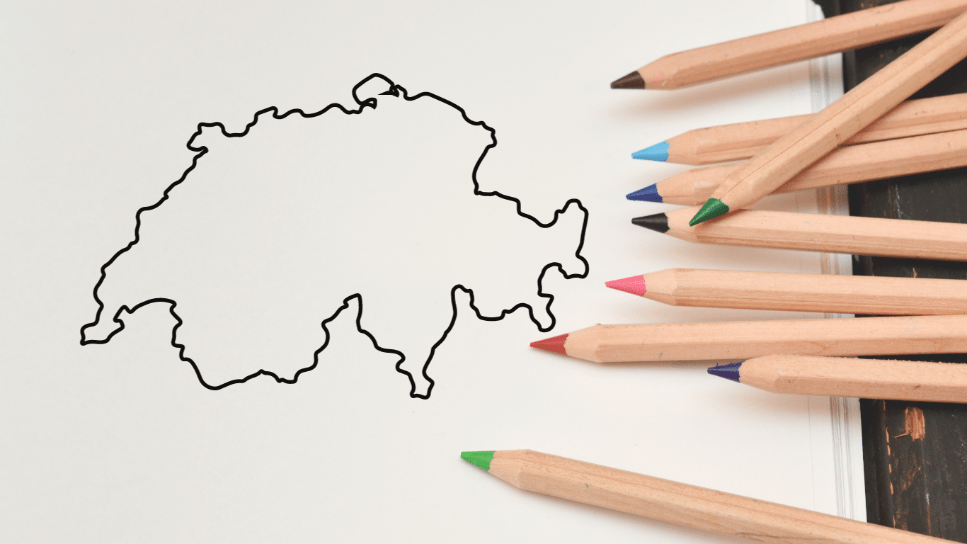 Le contour de la Suisse avec des crayons de couleurs