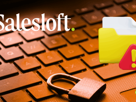Clavier d’ordinateur avec un cadenas, une icône de dossier jaune accompagnée d’un symbole d’alerte, et le logo de Salesloft, illustrant une fuite de données ou une faille de sécurité informatique.