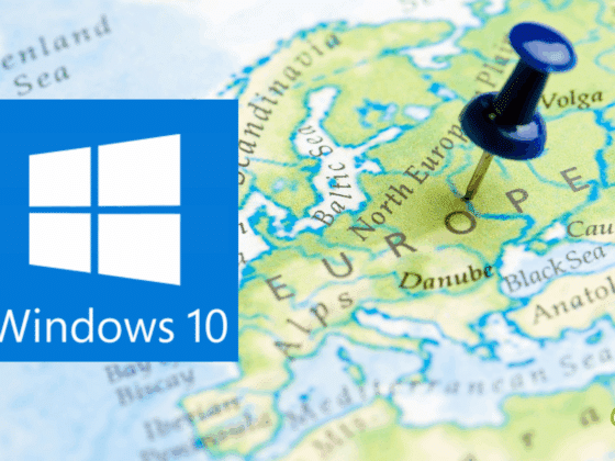 Logo de Windows 10 superposé sur une carte de l’Europe avec une punaise bleue plantée au centre du continent, illustrant le déploiement du système d’exploitation en Europe.