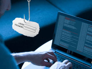 Un développeur tapant sur un ordinateur portable avec un écran affichant du code, tandis qu’un hameçon suspend un papier portant les champs « Login » et « Password », illustrant une attaque de phishing informatique.