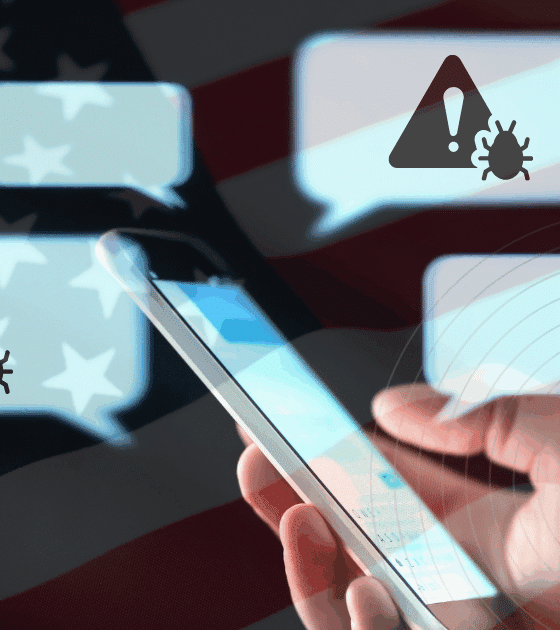Arnaques SMS aux USA : plus de 1 milliard $ volés par des gangs chinois 35 Main tenant un smartphone avec des bulles de conversation contenant des icônes d’alerte et de virus, sur fond de drapeau des États-Unis, illustrant les cyberattaques ou campagnes de désinformation via messagerie mobile.