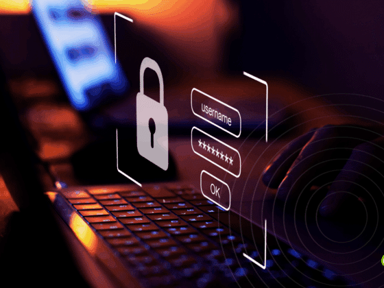 Main tapant sur un clavier d’ordinateur avec une interface virtuelle affichant un cadenas et des champs de connexion, symbolisant la sécurité des mots de passe et la protection des données personnelles.