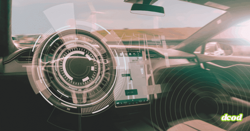 Vue intérieure d’un véhicule autonome affichant une interface numérique de navigation et de contrôle sur le pare-brise, illustrant les technologies embarquées et les systèmes intelligents d’assistance à la conduite.