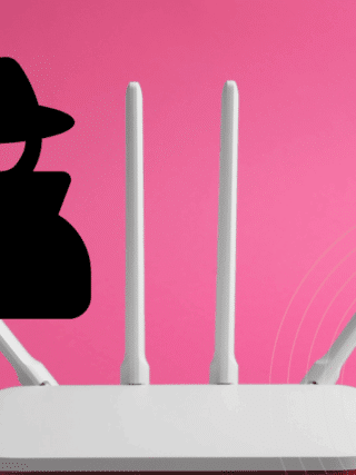 Un routeur blanc à antennes sur fond rose avec une silhouette noire de hacker symbolisant un détournement potentiel du réseau.