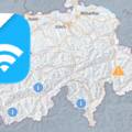 Carte de la Suisse affichant une icône de connectivité officielle et plusieurs symboles d’information et d’alerte répartis sur le territoire.