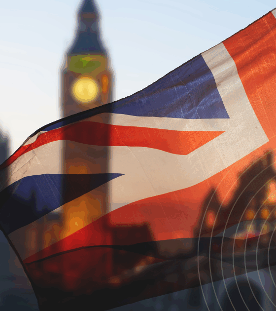 Le drapeau du Royaume-Uni flotte au premier plan avec Big Ben flouté derrière et des cercles numériques superposés.