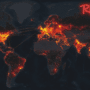 Carte du monde sombre avec des zones rouges lumineuses indiquant les cyberattaques de RedVDS, avec le logo rouge "RED VDS" en haut à droite.