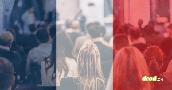 Illustration d'un événement professionnel ou d'une conférence de cybersécurité en France, public assis sous un filtre tricolore avec logo dcod.ch
