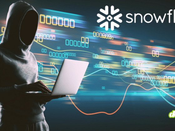 Illustration de cybersécurité représentant un individu anonyme en sweat à capuche manipulant un ordinateur portable, symbolisant le piratage du réseau The Com. En arrière-plan, des flux de données numériques colorés défilent avec le logo de l'entreprise Snowflake bien visible en haut à droite. Le logo dcod.ch figure en bas de l'image.