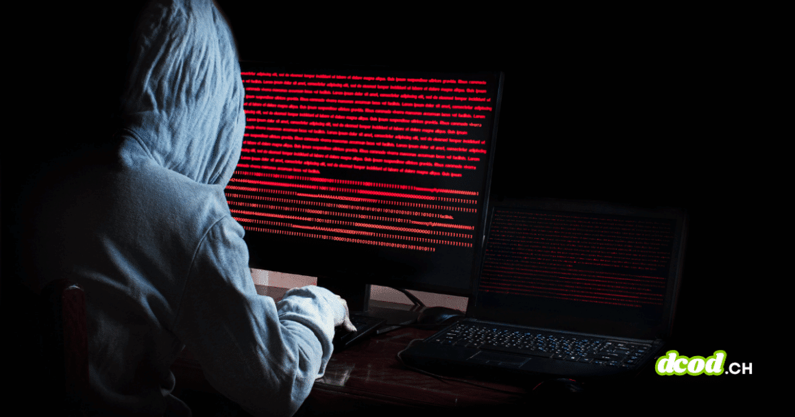 Image d'ambiance sombre montrant un attaquant manipulant du code informatique sur plusieurs moniteurs, symbolisant l'émergence du Vibeware et l'assistance de l'IA pour les cybercriminels.