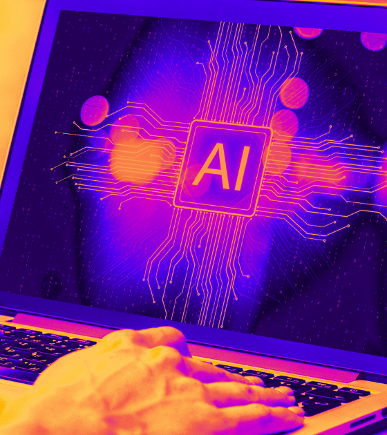 Photographie en gros plan de mains sur le clavier d'un ordinateur portable dont l'écran affiche un circuit imprimé stylisé violet et rose avec le texte central AI, portant le logo dcod.ch en bas à droite pour illustrer la découverte de failles zero-days.