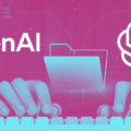 Illustration montrant des mains tapant sur un clavier avec les logos d'OpenAI et de ChatGPT, symbolisant le lancement du bug bounty pour sécuriser le modèle GPT-5.5.