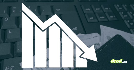 Graphique en barres avec flèche descendante sur fond de clavier d'ordinateur et de billets de banque, illustrant la chute des paiements de rançons après une attaque de ransomware