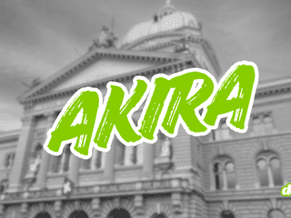 Palais fédéral suisse en noir et blanc barré du nom Akira en lettres vertes, illustrant la cyberattaque contre les données d'employés fédéraux.